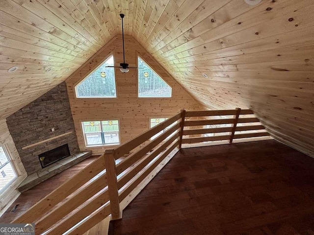 interior space featuring wooden ceiling and vaulted ceiling