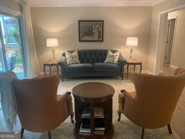 living room with crown molding