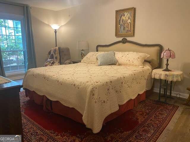 bedroom featuring hardwood / wood-style floors