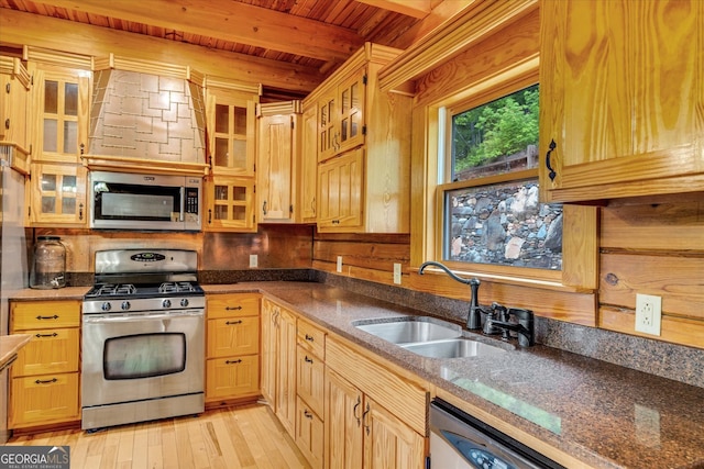 kitchen with light hardwood / wood-style flooring, stainless steel appliances, wooden ceiling, beamed ceiling, and sink