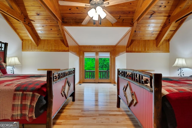 bedroom with light hardwood / wood-style floors, lofted ceiling with beams, ceiling fan, and wooden ceiling