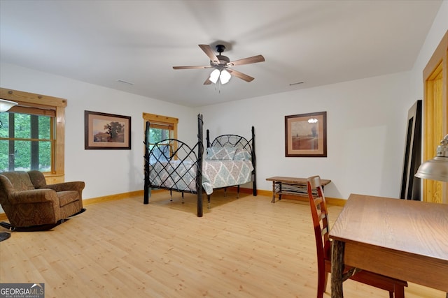 bedroom featuring ceiling fan and light hardwood / wood-style flooring