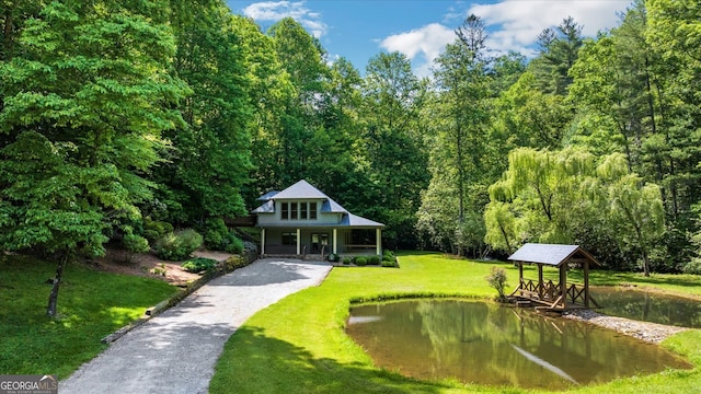 view of home's community featuring a yard