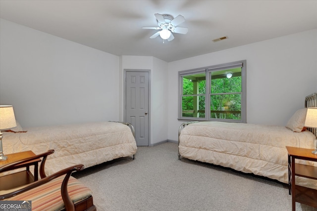 bedroom featuring ceiling fan and carpet floors