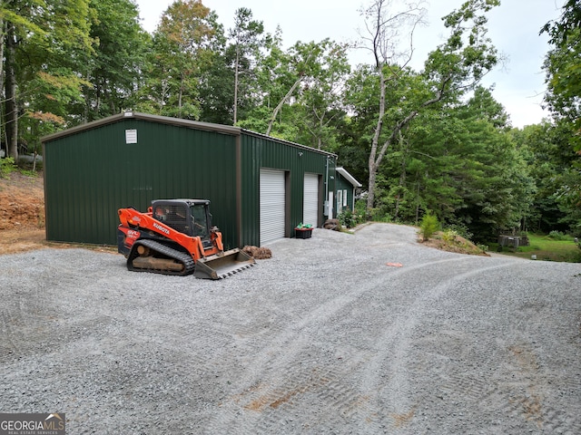 view of outdoor structure featuring a garage