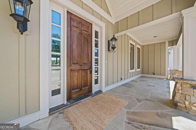 property entrance with covered porch