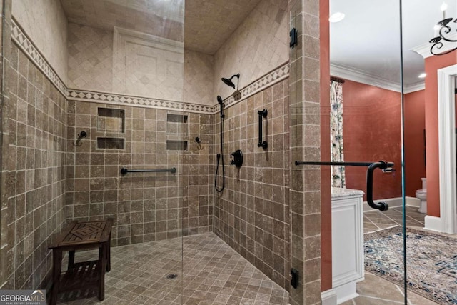 bathroom featuring crown molding, an enclosed shower, tile patterned floors, and toilet