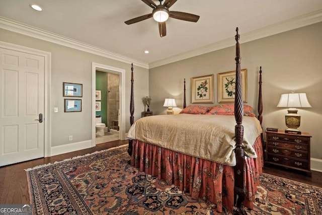 bedroom featuring ceiling fan, dark hardwood / wood-style flooring, ensuite bathroom, and crown molding