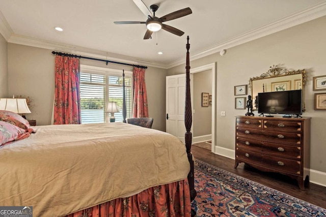 bedroom with dark wood-type flooring, ceiling fan, and crown molding