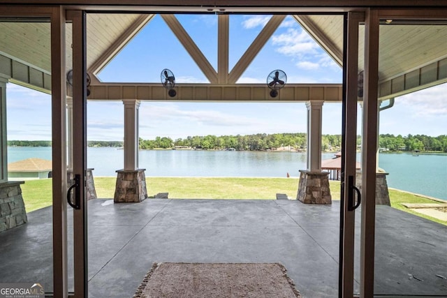 view of patio with a water view