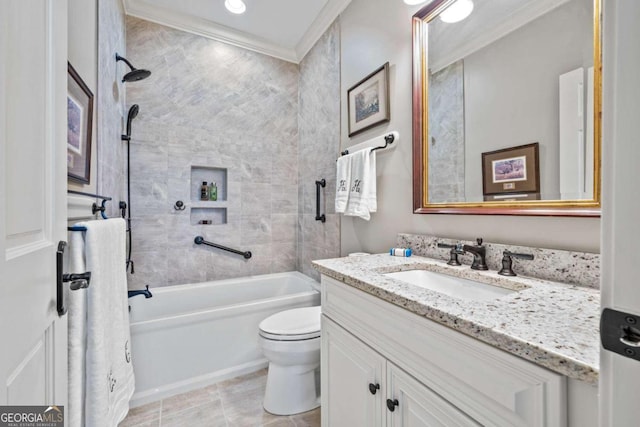 full bathroom featuring tiled shower / bath, tile patterned flooring, ornamental molding, toilet, and vanity