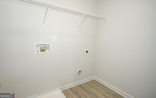 172 Chapman Rdg, Macon, GA 31211 - laundry area featuring hookup for an electric dryer, light wood finished floors, hookup for a washing machine, and baseboards