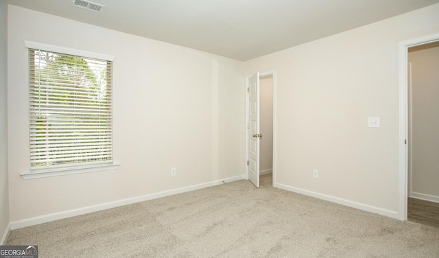 172 Chapman Rdg, Macon, GA 31211 - carpeted empty room with baseboards
