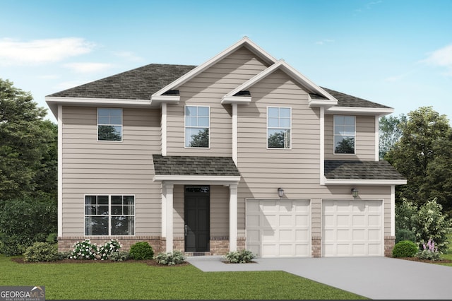 view of front of house featuring a garage and a front lawn