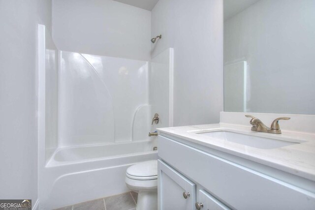 168 Chapman Ridge Rd, Macon, GA 31211 - full bath with toilet, vanity, tile patterned flooring, and tub / shower combination