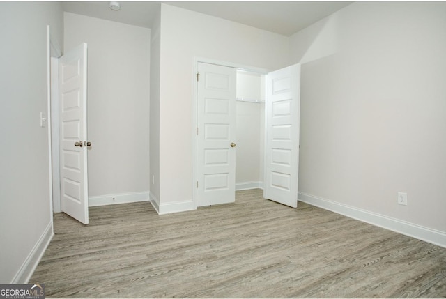 168 Chapman Ridge Rd, Macon, GA 31211 - unfurnished bedroom with wood finished floors and baseboards