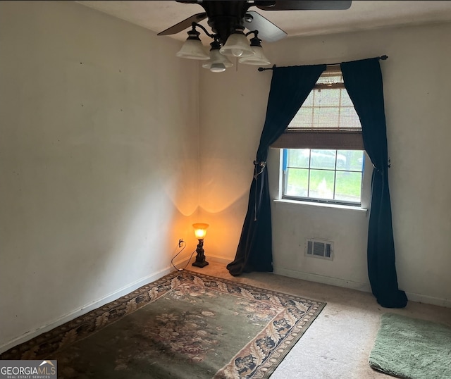 empty room featuring ceiling fan