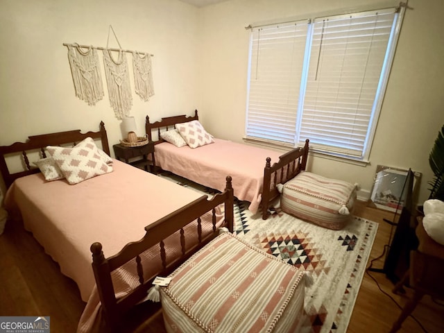 bedroom featuring hardwood / wood-style floors