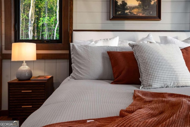 bedroom featuring dark hardwood / wood-style flooring