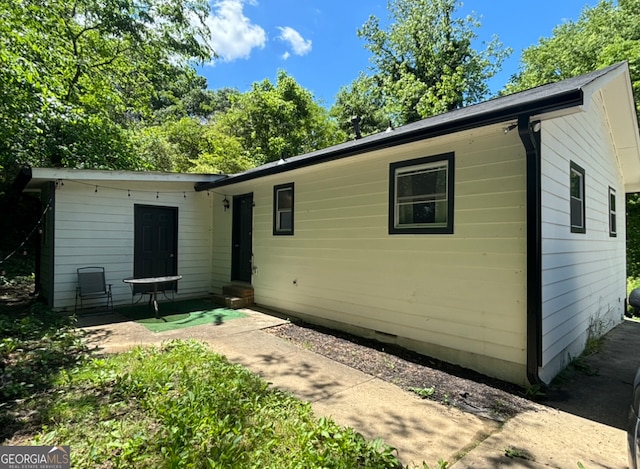 rear view of house with a patio