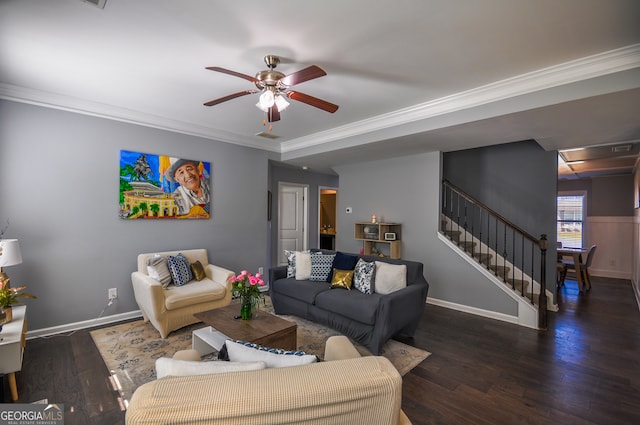 living room with ceiling fan, hardwood / wood-style flooring, and ornamental molding