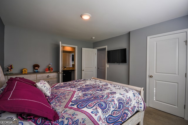 bedroom featuring carpet