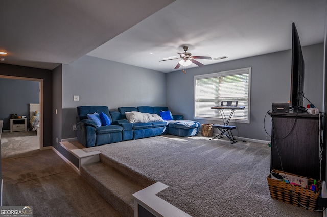 living room featuring ceiling fan and carpet