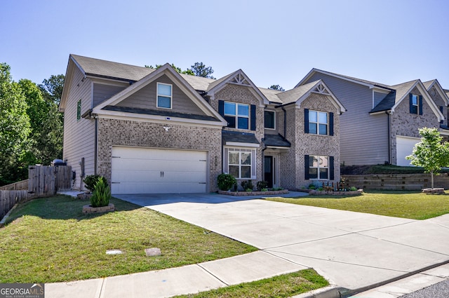 craftsman inspired home with a garage and a front yard