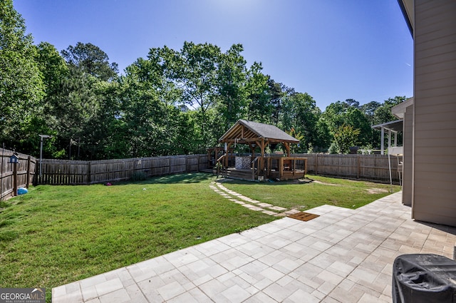 view of yard featuring a gazebo and a patio