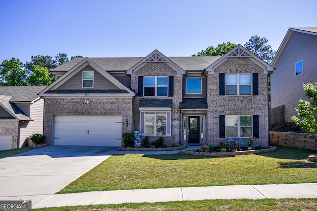 craftsman-style house featuring a garage and a front lawn