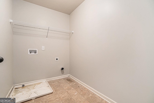 washroom with electric dryer hookup and hookup for a washing machine