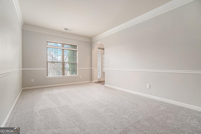 empty room with light carpet and ornamental molding