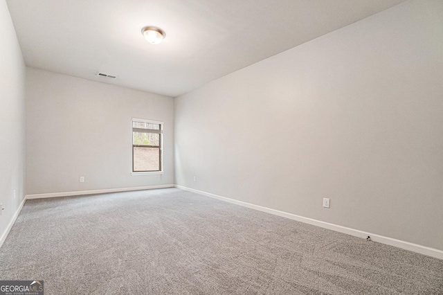 view of carpeted spare room