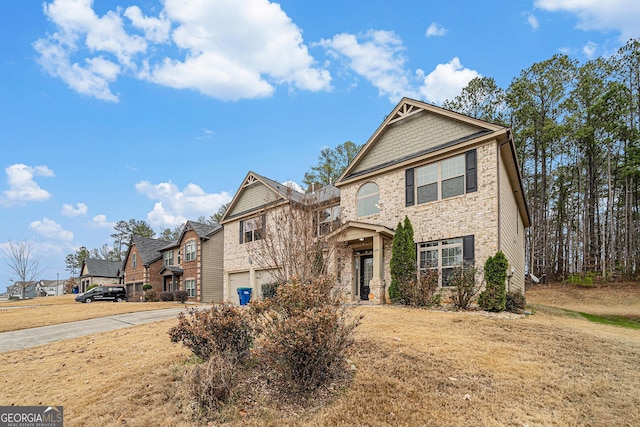 view of front of property with a garage