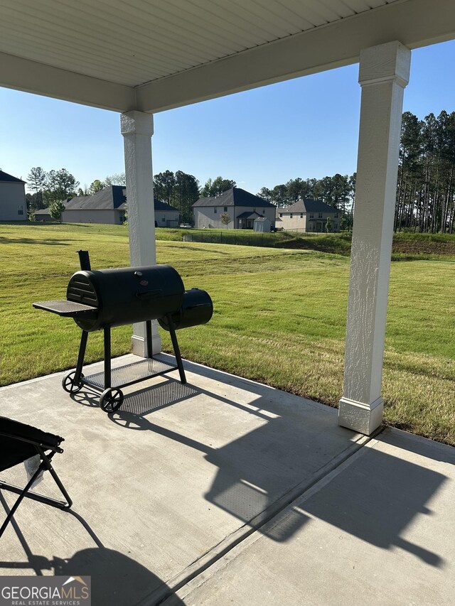 exterior space with a yard and a patio