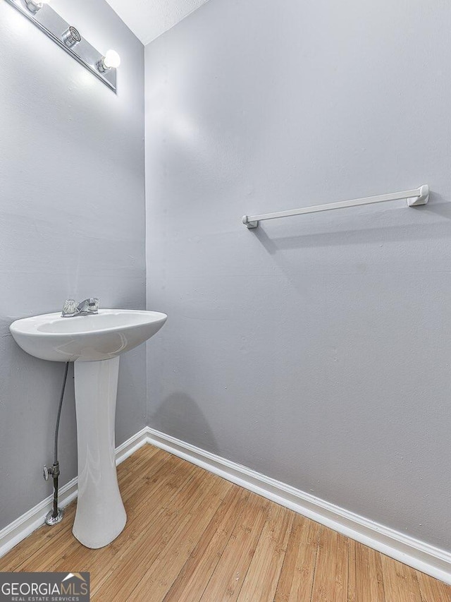 bathroom featuring hardwood / wood-style floors