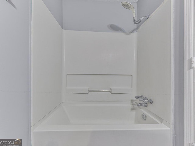 bathroom with shower / bath combination