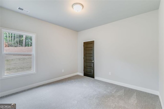 empty room featuring carpet