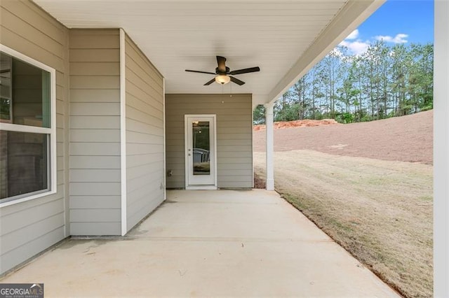 view of patio with ceiling fan