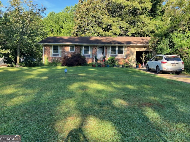 1433 Woodland Ter SW, Atlanta, GA 30311 - single story home featuring a front yard and brick siding