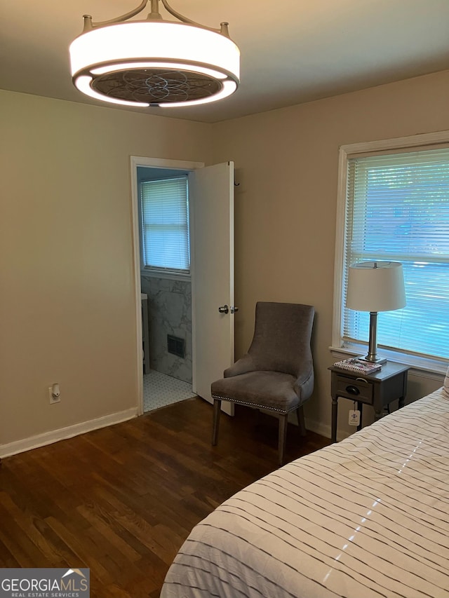 bedroom featuring dark wood-type flooring