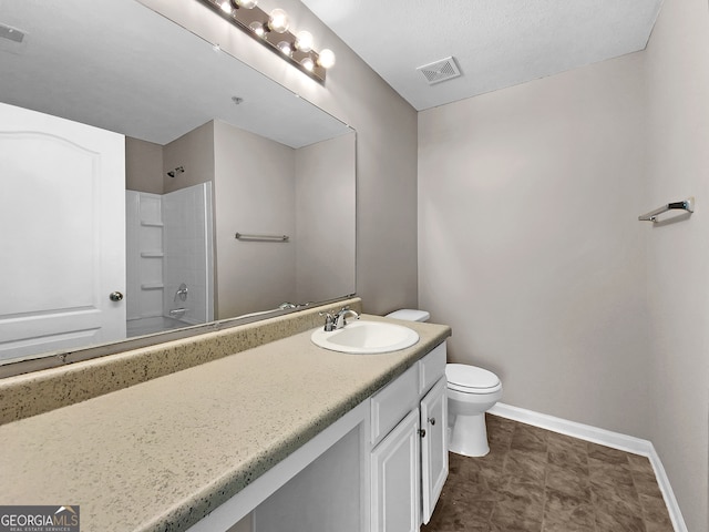 full bathroom with vanity with extensive cabinet space, shower / washtub combination, toilet, and tile flooring