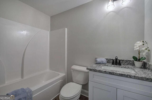 full bathroom with shower / tub combination, vanity, and toilet