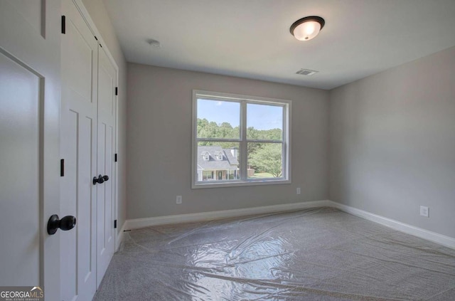 view of carpeted spare room