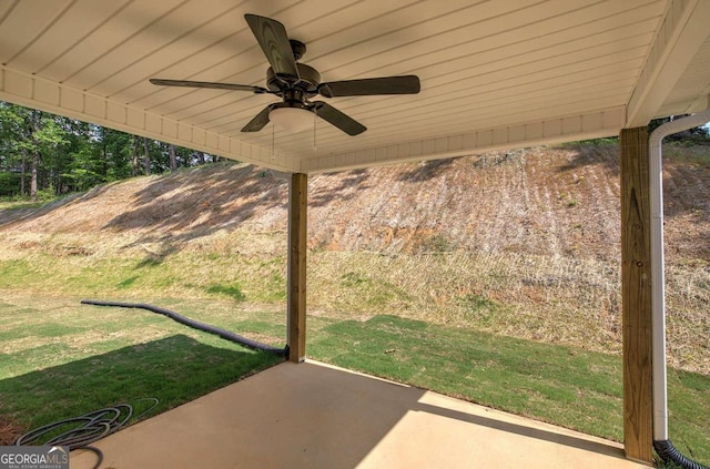 view of patio featuring ceiling fan