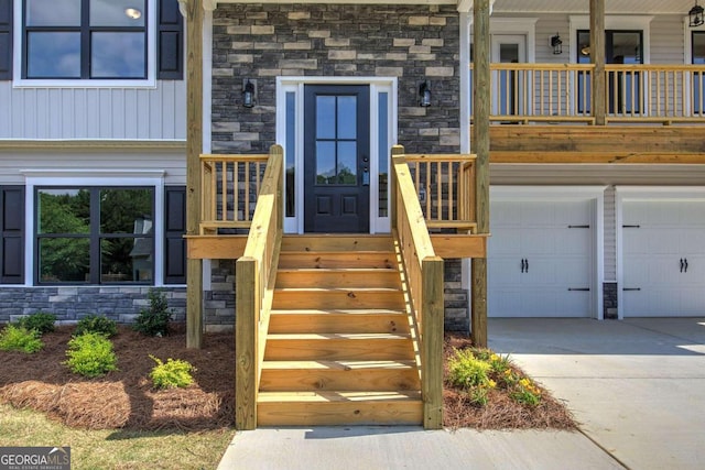 view of exterior entry featuring a garage