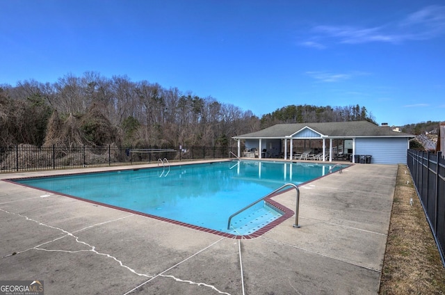 view of swimming pool featuring a patio