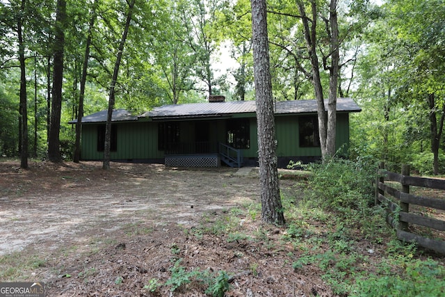 350 County Road 700, Cedar Bluff, AL 35959 - view of front facade with a chimney and fence