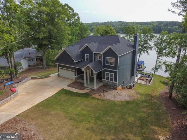 view of front facade with a garage and a front lawn