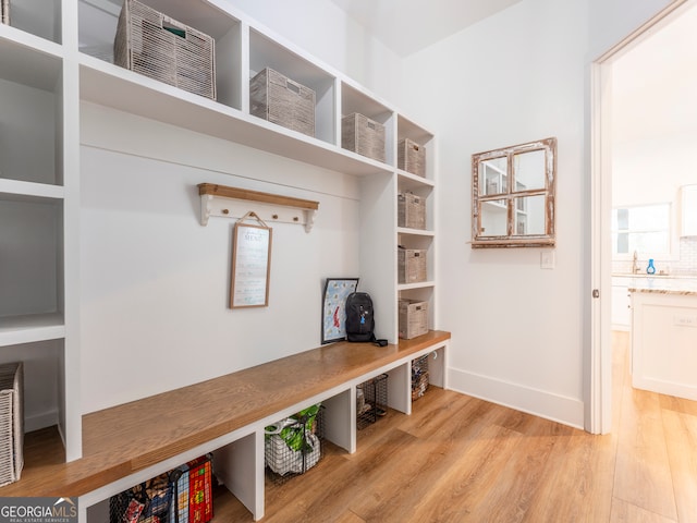 mudroom with light wood-type flooring